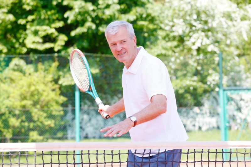 Active Senior Man Tennis Exercise