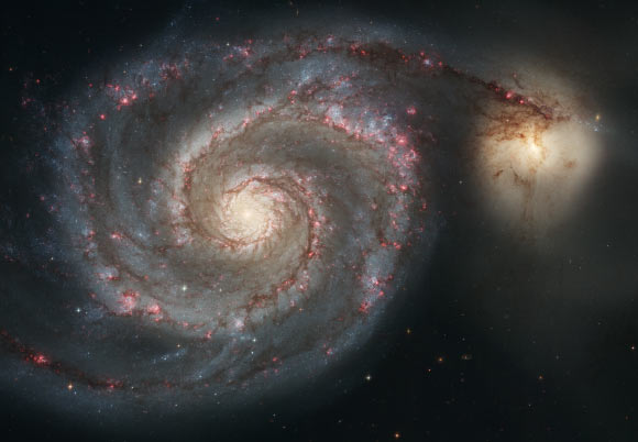 La découverte d'une éventuelle cinquième force de la nature changerait complètement notre compréhension de l'Univers, selon Jonathan L. Feng et al. Cette image Hubble montre la galaxie Whirlpool (également connue sous le nom de Messier 51 et NGC 5194) et sa galaxie compagne, NGC 5195. Crédit image : NASA / ESA / S. Beckwith, STScI / Hubble Heritage Team / STScI / AURA.