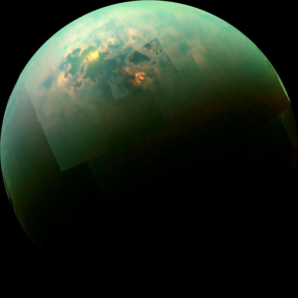 Une image en mosaïque dans le proche infrarouge de Titan, la lune de Saturne, montre le soleil se reflétant et scintillant sur les mers polaires du nord de Titan. Crédit d'image : NASA/JPL-Caltech/Université de l'Arizona/Université de l'Idaho